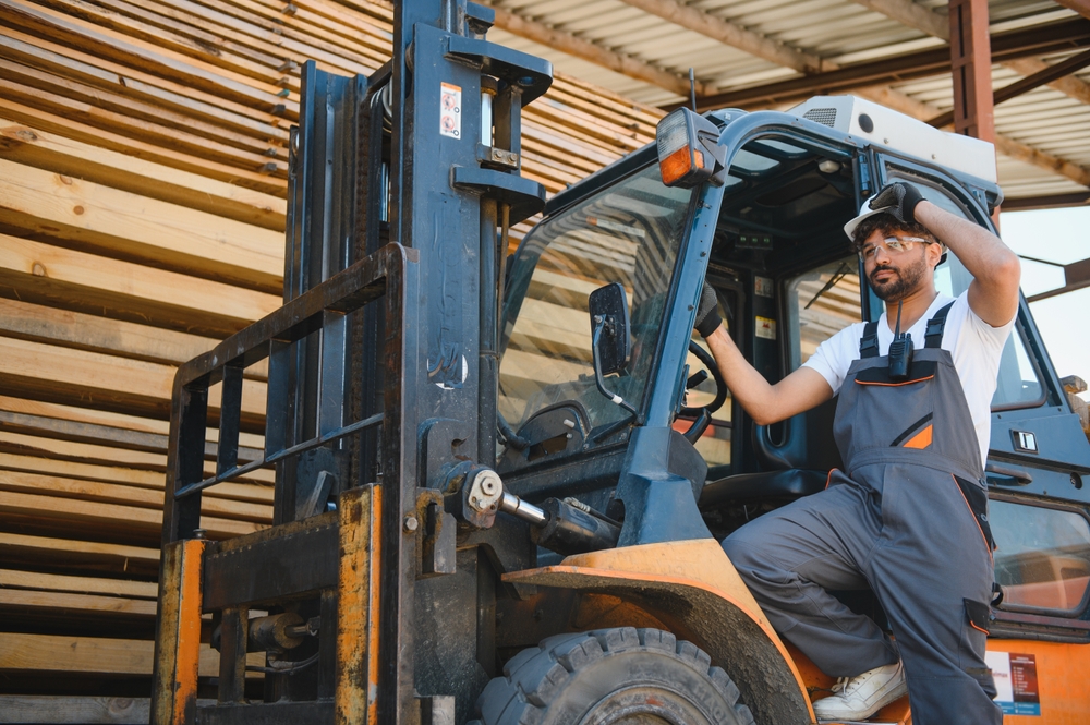 Vendor operating a forklift in a construction supply warehouse